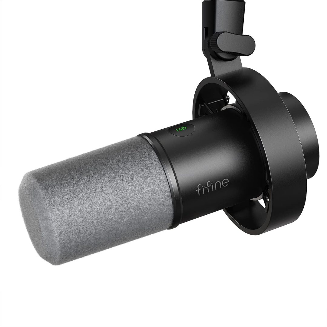 The FIFINE K688 microphone mounted on a boom arm in a modern creator's setup.